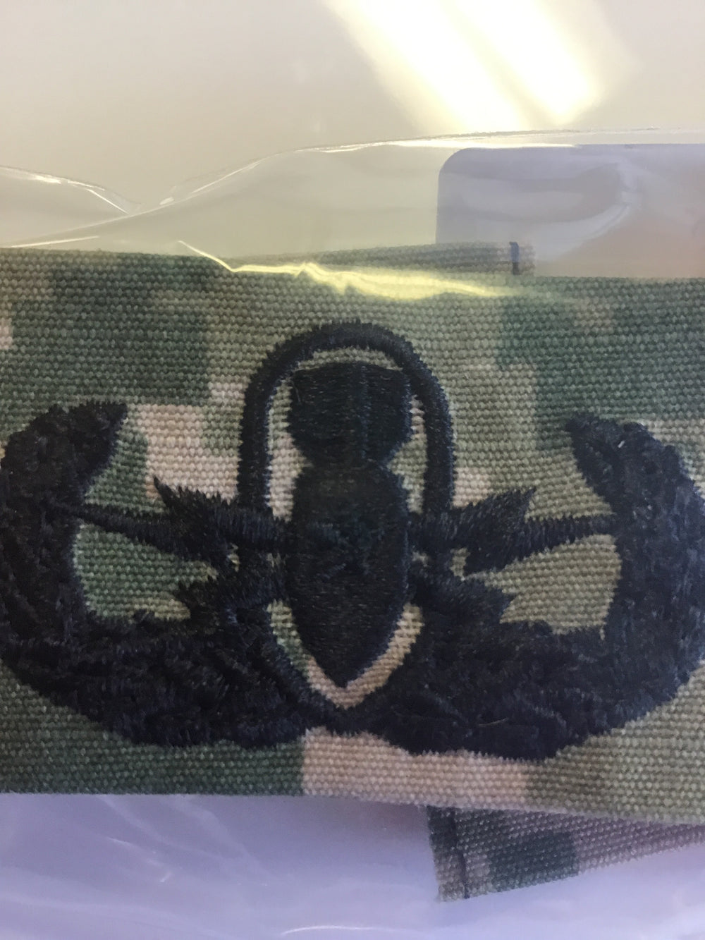 Navy Badge Woodland Dig